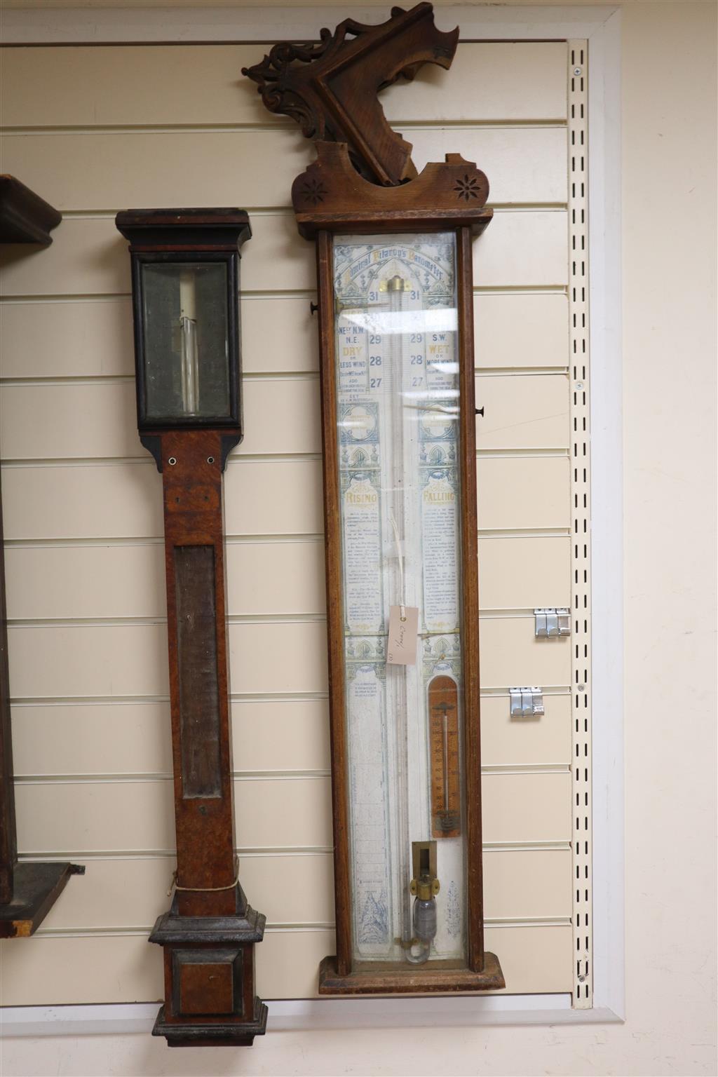 A Negretti and Zambra oak stick barometer, an admiral fitzroy barometer, a german wall clock - restoration needed